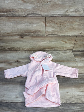 Front view of pink Le Petit Elephant hooded baby bathrobe showcasing attached hood with elephant ears and matching belt on wood floor background