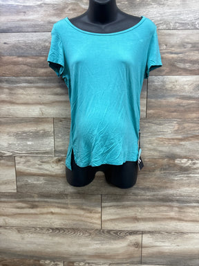 Teal short sleeve women's maternity t-shirt on mannequin against wood backdrop