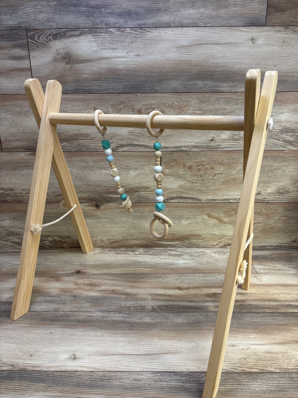 SlickBlue Wooden Play Gym with 2 Hanging Toys