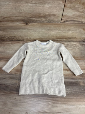 Ivory long-sleeve toddler sweater dress with iridescent sequin embellishments on chest