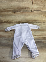 Back view of Carter's lilac blanket sleeper, size 3 months, showing floral-trimmed cuffs and footed legs on a light wood floor