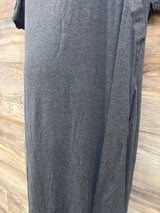 Front view of gray Frida delivery and nursing gown showcasing snap closures on a wood floor