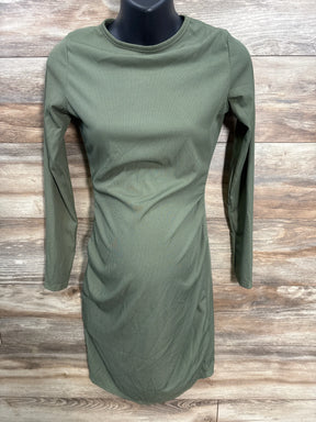 Olive green ribbed long sleeve maternity dress on mannequin, wood background