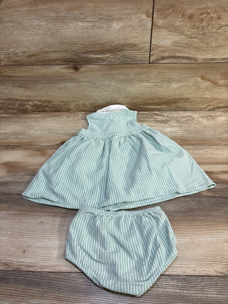 Flat lay of Ralph Lauren mint striped cotton dress with matching bloomers, ribbed collar and full skirt on wood background
