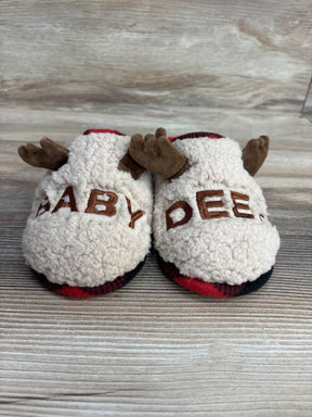 Plush baby slippers with 'BABY DEER' text and brown antler details on wood background