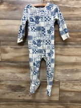 Blue and white race car print baby footed pajamas with zipper, perfect for kids' sleepwear