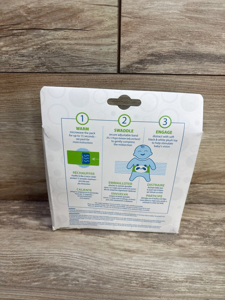 Back of Dr. Brown's GripeBelt packaging showing warming pack, adjustable swaddle band and panda illustration on wood
