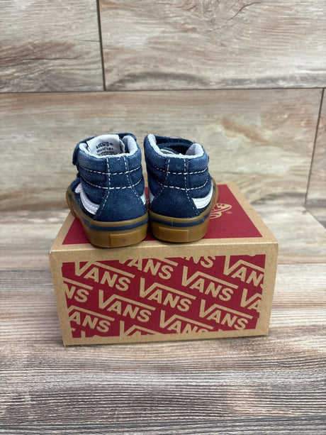Rear view of blue Vans SK7-Mid Reissue V sneakers showcasing suede and denim uppers with gum soles on a Vans shoebox