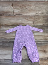 Flat-lay of purple PatPat Care Bears heart print long-sleeve coverall showcasing white hearts all over and snap cuffs on a wood floor