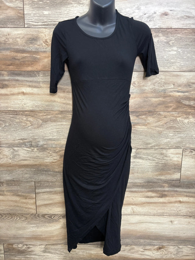Front view of Isabella Oliver black maternity short-sleeve midi dress showing side ruching and tulip wrap hem on mannequin