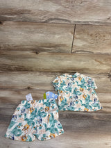 Baby short sleeve shirt and shorts set with Bluey character and leaf print on wood floor