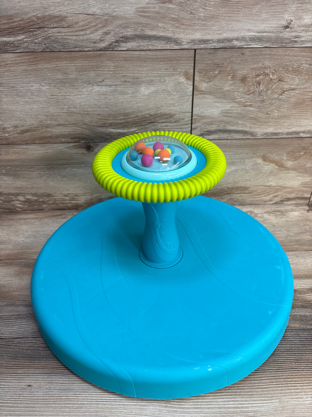 B. Toys Twirly Time Spinning Activity Toy