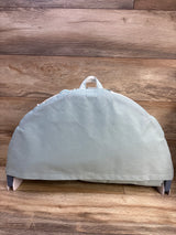 Back view of Yookidoo 3-in-1 Urban Gymotion Lay to Sit-Up Play Mat showing carry handle and support legs on a wood floor