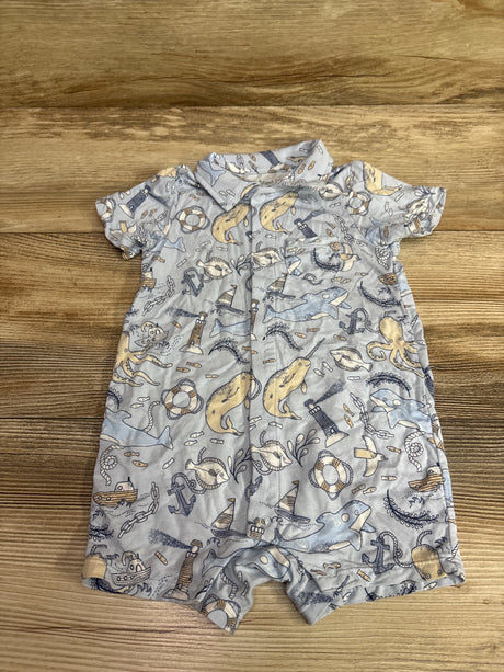 Blue Angel Dear bamboo button-front shortie romper with nautical print on wooden background