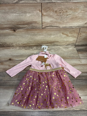 Pink long sleeve girls dress with gold heart tulle skirt and deer print bodice on wood floor