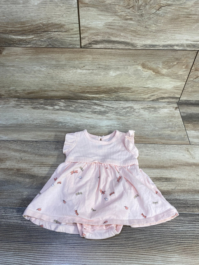 Flat lay of pink ribbed Carter's Firefly bodysuit dress showing ruffled cap sleeves and dragonfly print skirt on wood floor background