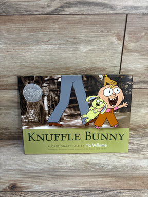 Knuffle Bunny children’s book by Mo Willems on wood background, Caldecott Honor badge, used kids books