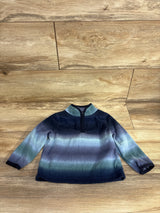 Long sleeve toddler pullover sweater with blue and green ombre stripes on wood floor