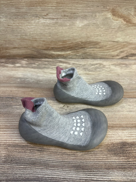 Top-down view of Bearbay grey sock shoes (size 7/8C) showing rubber soles, white non-slip grip dots, and ankle sock cuffs on a wooden background