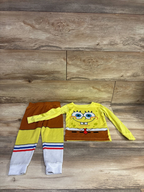 Front view of Nickelodeon SpongeBob SquarePants two piece pajama set in yellow and brown, featuring a SpongeBob top and striped cuffs