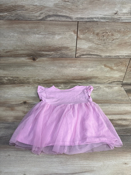 Flat lay of Carter's pink toddler tulle shirt size 5T showing layered tulle skirt and ruffled sleeves on wood floor