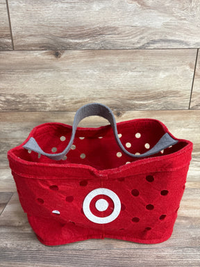 Red polka dot felt basket with white bullseye logo, gray handle, on wood floor