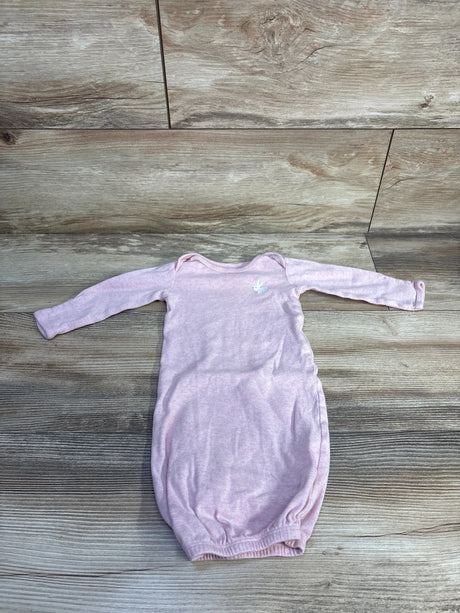 Flat lay of newborn pink Simple Joys sleep gown showing long sleeves, elastic gathered bottom, and small white embroidered bunny on wood background