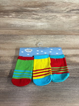 Front view of 3-pack baby socks (size 0-12M) showing bright stripes on a display card on a wood tabletop