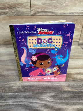 Disney Junior Doc McStuffins Little Golden Book Shake Your Tail Feathers on wood surface