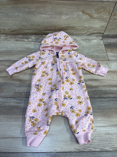 Front view of Carter’s pink hooded coverall with floral pattern, zipper, and ribbed cuffs on a wood-grain background
