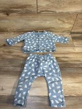 Blue baby outfit set with white bear print, includes long sleeve top and pants, laid flat on wood