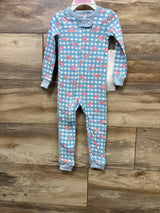 Blue gingham baby onesie with pink bows, long sleeves, front zipper, on wooden floor