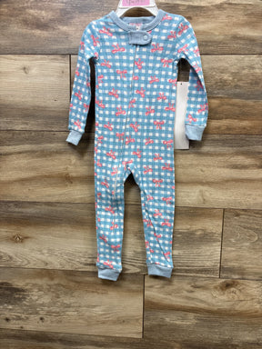 Blue gingham baby onesie with pink bows, long sleeves, front zipper, on wooden floor
