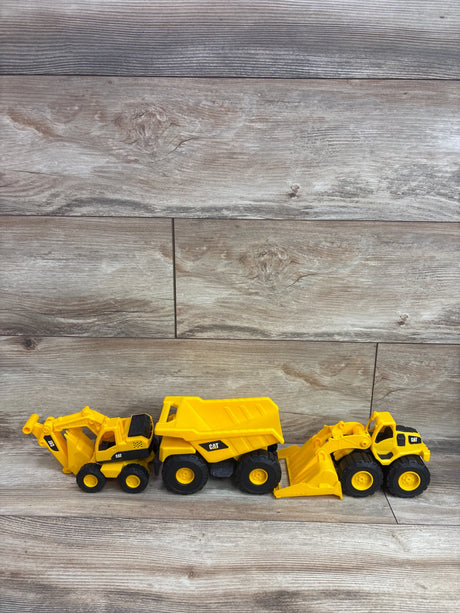 Side view of Funrise 3pk CAT Construction Vehicles showcasing three yellow construction trucks on a wood-look background
