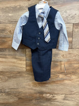 Front view of Van Heusen 4-piece 12M suit: navy three-button vest, striped tie, light blue shirt, and navy pants on wood floor