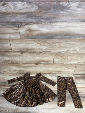 Leopard print long sleeve dress and matching leggings on wooden floor