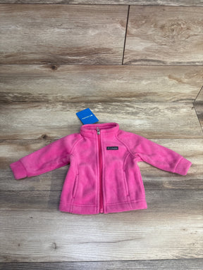 Pink Columbia toddler fleece jacket with zipper and tag on wood floor