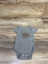 Flat lay grey 3–6M bodysuit with three snaps and brown football graphic reading Daddy's New Sunday Funday Partner