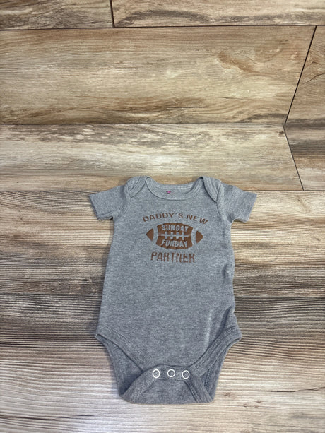 Flat lay grey 3–6M bodysuit with three snaps and brown football graphic reading Daddy's New Sunday Funday Partner