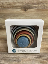 Mary Meyer Simply Silicone colorful stacking rings toy for kids in white box on wooden surface