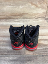 Black and red Nike toddler sneakers with bold swoosh, perfect for kids' active play and resale fashion.