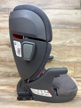 Side view of UPPAbaby Alta V2 booster car seat in Greyson showing gray upholstery, headrest, armrest, and side-impact protection