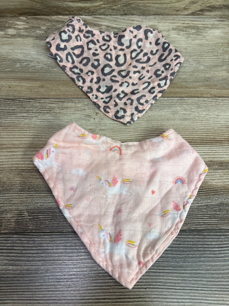 Top-down view of Angel Dear 2pk bandana bibs showcasing pink leopard and rainbow prints on a wood-grain background