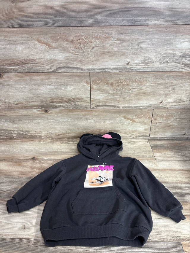 Front view of charcoal H&M x Disney Minnie hoodie size 4T with Minnie print and hood ears on wood background