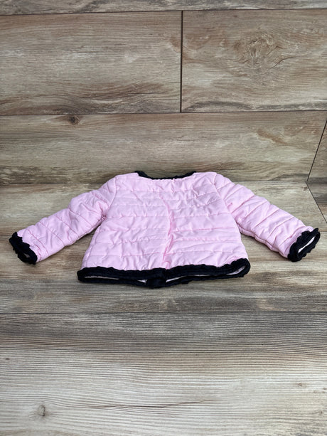 Front view of pink Little Me lightweight puffer jacket showcasing quilted panels and black trim on wood flooring