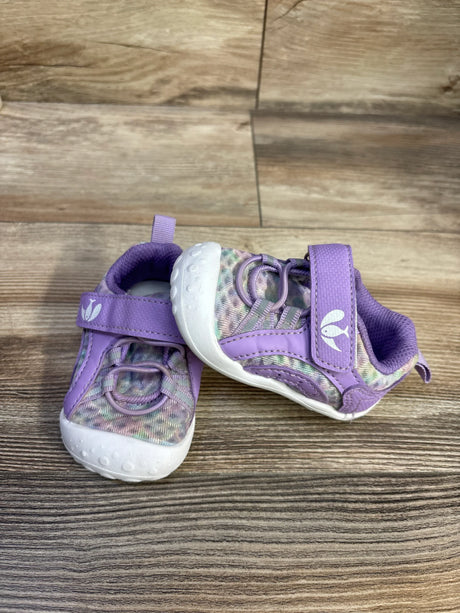Front three-quarter view of FEETCITY wide toddler water shoes in purple with Velcro strap and white toe on wood background