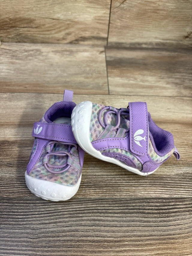 Front three-quarter view of FEETCITY wide toddler water shoes in purple with Velcro strap and white toe on wood background