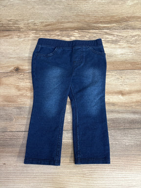 Dark blue toddler jeans with elastic waistband on wood background, kids pants