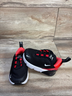 Angled front view of toddler Nike Air Max 270 Bred sneakers, black with red lining and white sole on wood background