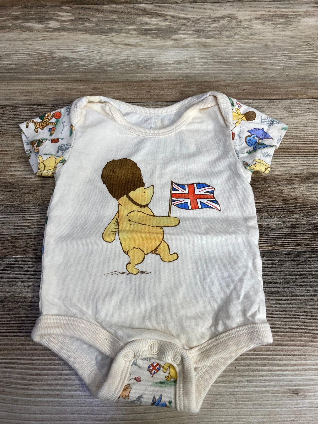 Disney Parks Winnie the Pooh British Flag Bodysuit Beige sz Newborn